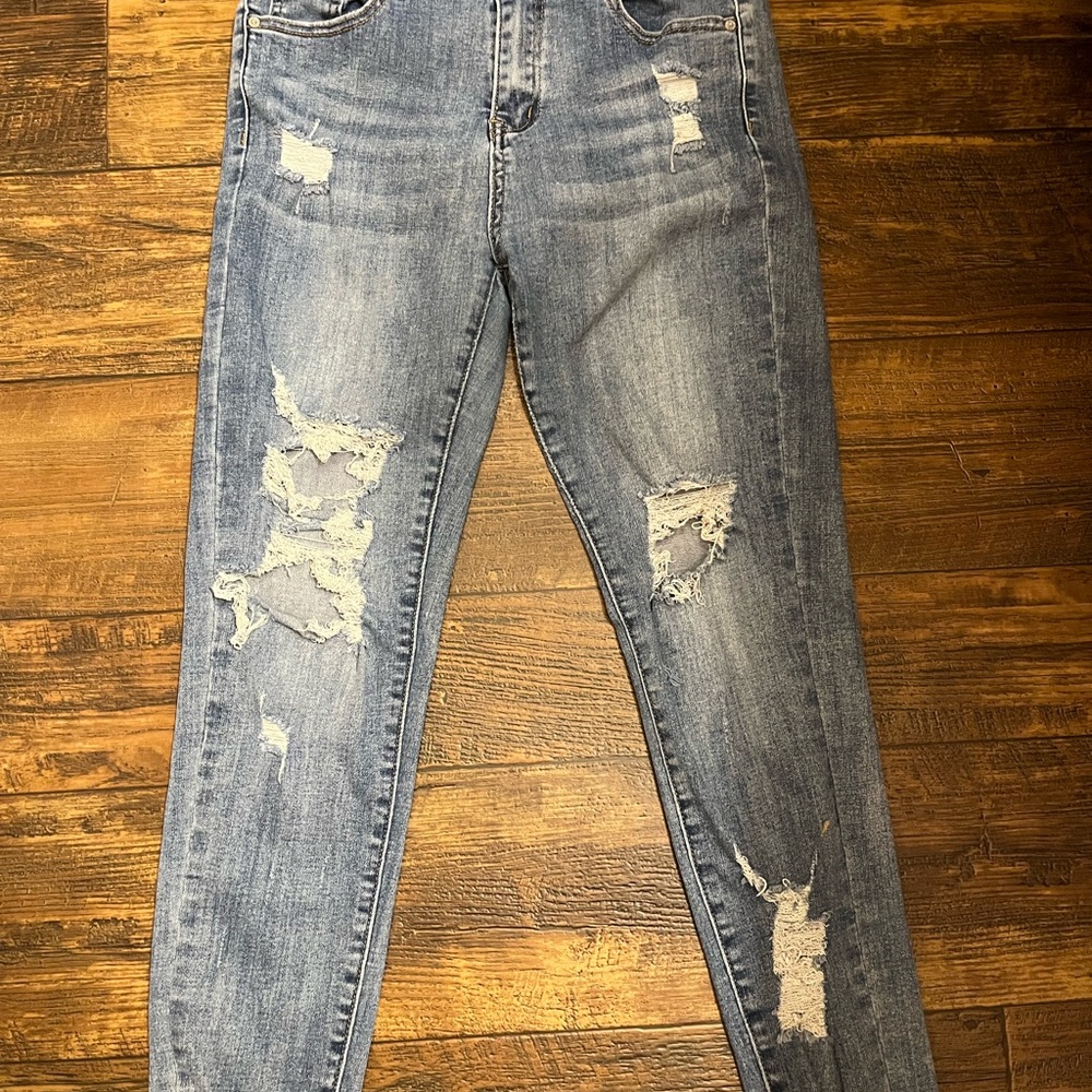 Distressed Blue Jeans